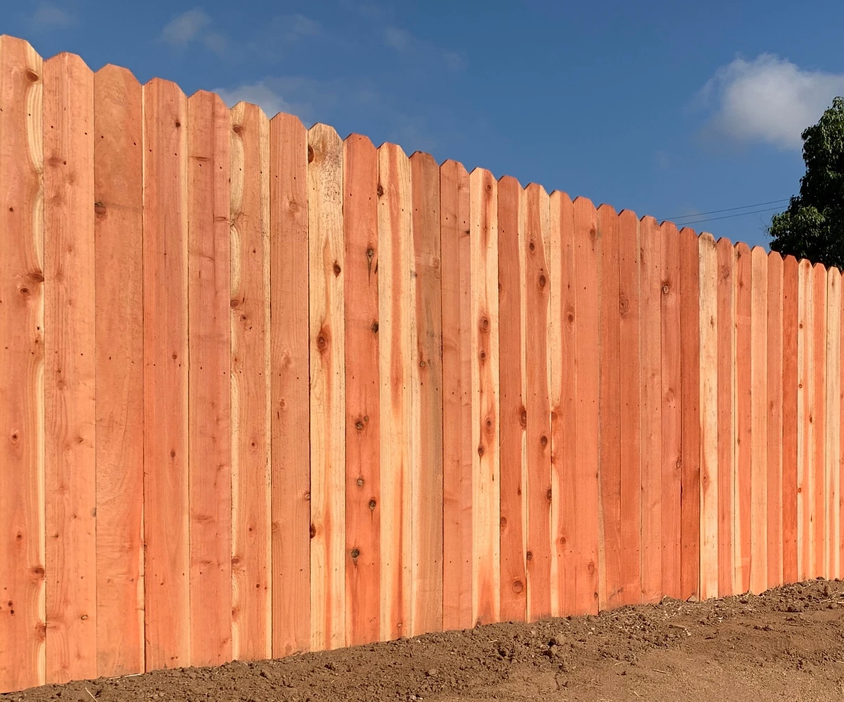 Dog-ear redwood privacy fence