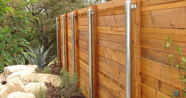 Horizontal cedar fence with metal posts