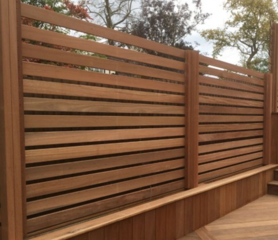 Horizontal slat redwood fence